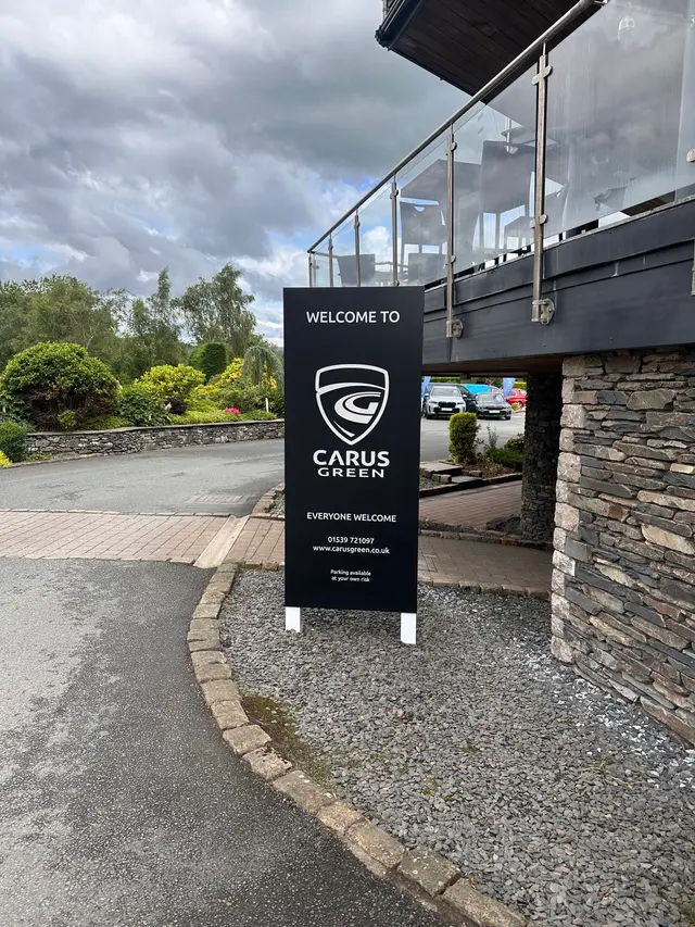 Carus Green totem sign
